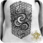 Incredible geometric snake moon mandala by Kirk Nilsen @kirknilsentattoos #tattoodo #geometric #dotwork #snake #moon #mandala #kirknilsen #kirknilsentattoos