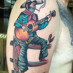 Cowboy toca la guitarra Tattoo by Pancho #PanchosPlacas #Oldschool #Traditional #Cowboytattoo #cowboy #guitar