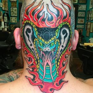 Awesome and brutal cobra head tattoo by Marc Nava. #MarcNava #Cobra #traditionaltattoo