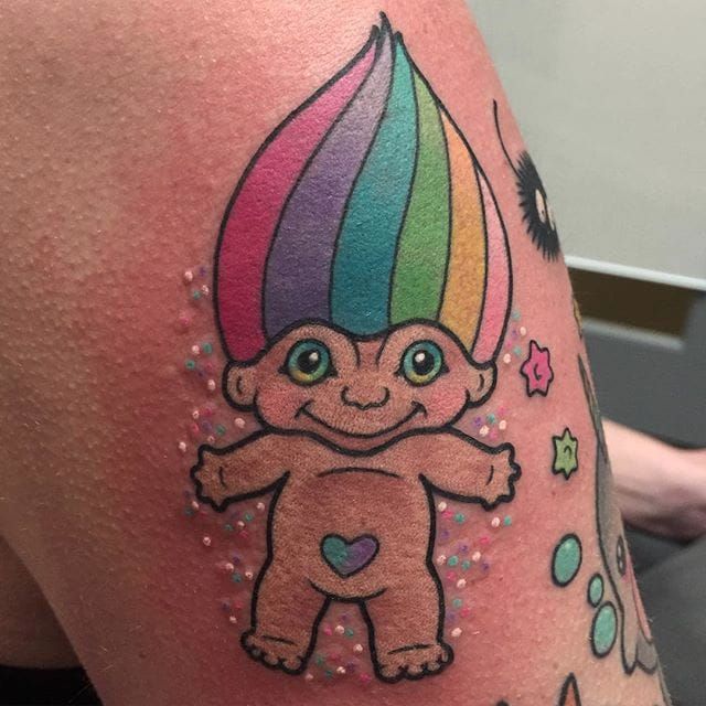 My bf tattooed one of our troll dolls and Im  Troll Doll Guardian