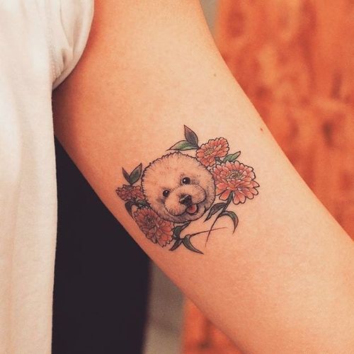 Dainty dog tattoo by Grain. #Grain #TattooistGrain #fineline #animals #dog #cute #pretty #flowers #pet