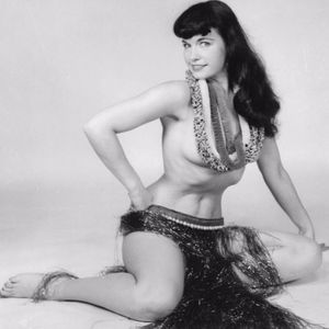 A photograph of the gorgeous Bettie Page dressed as a luau girl. #pinups #unique #unusual #bettiepage