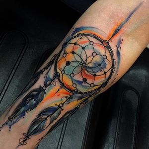 Make all your dreams come true with a watercolor dream-catcher tattoo by Jean Alvarez. #abstract #watercolor #JeanAlvarez #dreamcatcher