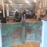Greenpoint Tattoo Co.'s vintage saloon doors (IG—greenpointtattooco). #GreenpointTattooCo #NYCtattooshops