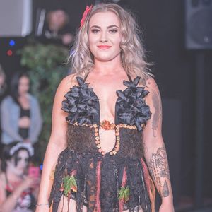 Stunning dress and tattoos on this competitor. #missink #newzealand (Photo by Mitch Tucker, Faction Photography Ltd, Mail New Zealand website)
