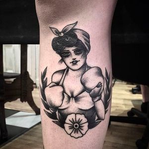 Rad looking boxer lady tattoo done by Anem. #Anem #traditionaltattoo #girl #girltattoo #boxer #traditional #traditionalgirl #blackandgrey