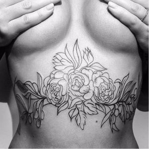 Beautiful flower sternum tattoo by @alisovatattoo #AlisaAlisova #flowers #sternum #linework #blackwork