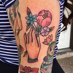 Traditional hand and flower tattoo by Randy Conner. #traditional #RandyConner #hand #flowers