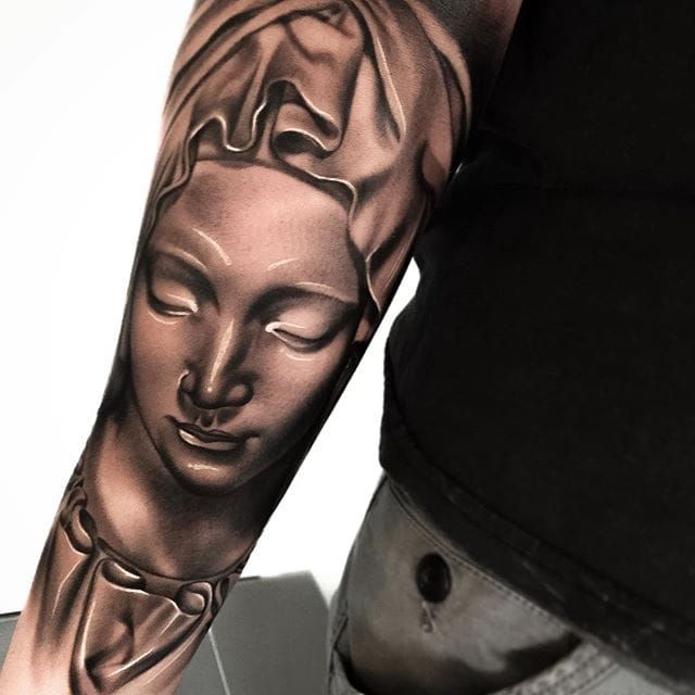 virgin mary face tattoo designs