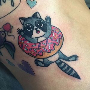 Donut tattoo by Christina Hock. #ChristinaHock #DolorosaTattooCo #donut #racoon