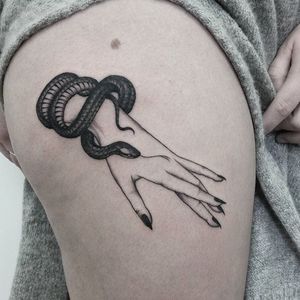 Snake-hand tattoo by Sera Helen. #SeraHelen #blackwork #oldschool #fineline #classic #snake #serpent #hand