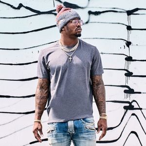 Von Miller showing off his tattoos that he got somewhere other than on a private jet.