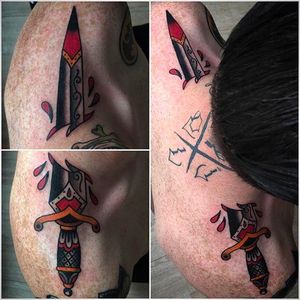 Awesome placement with this dagger on the shoulders. Tattoo done by Moira Ramone. #MoiraRamone #25toLife #traditionaltattoo #dagger #shoulder #coloredtattoo