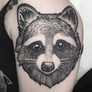 This adorable raccoon by Lawrence Edwards want to pilfer your garbage can (IG—feraleyes). #animals #blacktattoo #lawrenceedwards #pointillism #raccoon