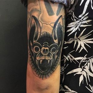 Awesome bat head blast over tattoo done by Wilson Ng. #WilsonNg #BoldTattoos #traditionaltattoo #bat #bathead #blastover #traditional