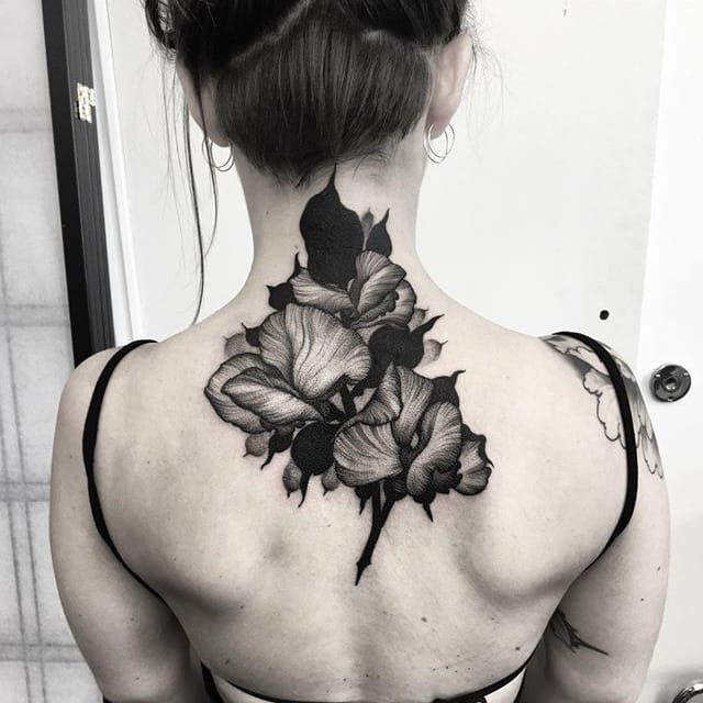 Be irresistible with violet flower tattoo in black and white