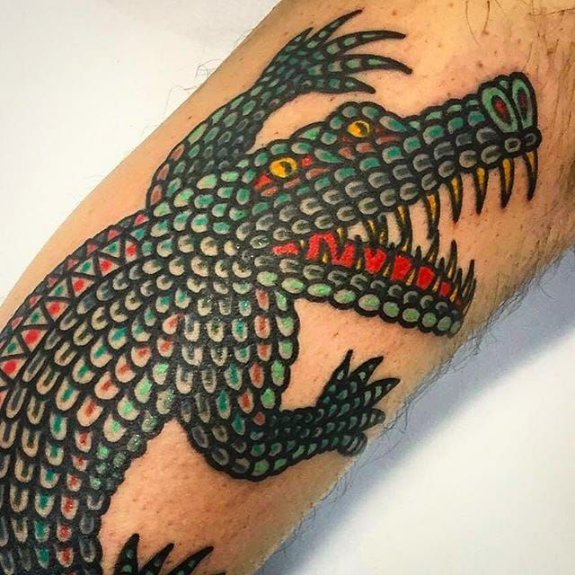 Black traditional crocodile done by Paro at the Tattoo Movement in Enmore  Australia  Traditional black tattoo Traditional tattoo man Crocodile  tattoo
