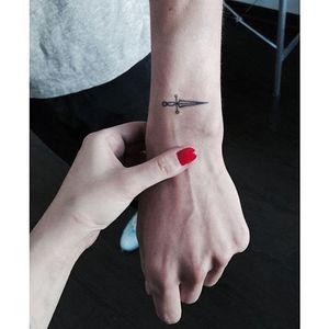 Minimalist dagger tattoo, @sue_naa/Instagram. #microtattoo #subtle #minimalist #dagger #minimalistic