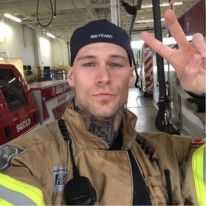 Peace out from this cutiepie photo from Marshall Perrin on Instagram #MarshallPerrin #tattoomodel #tattooedguys #firefighter #traditionaltattoo #tattoododudes