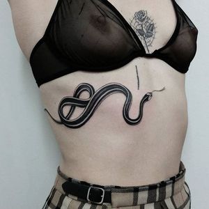 Serpent tattoo by Sera Helen. #SeraHelen #blackwork #oldschool #fineline #classic #serpent #underboob #snake