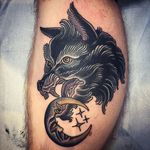 A wolf's head with a cresenct moon dangling from its jaws by Heather Bailey (IG—cathedraloftears). #cresentmoon #gothic #HeatherBailey #traditional #wolf