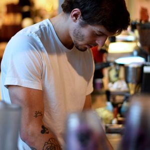 Sam from Joe and the Juice #TattoosAtWork #JoeandtheJuice #SamGlenn #barista #cafe #Copenhagen #mickey #mickeymouse #employee #work