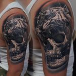 Tiger head and skull tattoo by James Artink. #tiger #tigerhead #animalhead #skull #realism #blackandgrey #JamesArtink