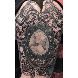 Lace around an old cameo tattoo by Nikki Snyder. #blackwork #linework #cameo #lace #NikkiSnyder