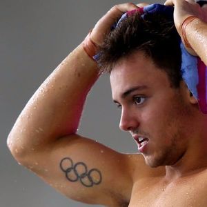 Tom Daley's Olympic Ring Tattoo #OlympicTattoos #OlympicRingTattoos #OlympicRings #SportsTattoo #AthleteTattoos