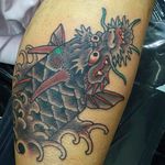 clean and solid dragon koi tattoo by Horitatsu. #Horitatsu #japanesestyle #irezumi #Japanesetattoo #kyoto #osaka #dragonkoi #koidragon
