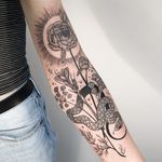 Flower and snake tattoo by Pony Reinhardt #PonyReinhardt #freeorgy #linework #dotwork #illustrative #flowers #herbs #nature #leaves #snake #reptile #sun #light #sparkle #stars #tattoooftheday