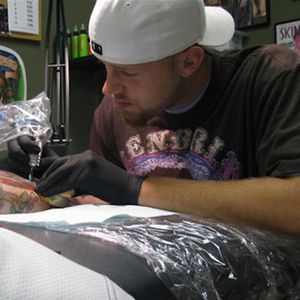 Photo of Steve Wimmer (IG—stevewimmer) tattooing a client's arm. #celebrities #musicians #portraiture #realism #SteveWimmer