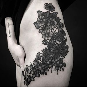 Blackwork floral thigh piece tattoo by WookJuun Lee. #WookJuunLee #MadamTattooer #Madam #blackwork #floral #flower #feminine