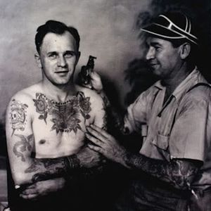 One of Bert Grimm's clients with the iconic tiger head on his chest. #BertGrimm #tattoohistory #traditional