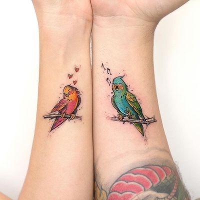 Matching tattoos by Robson Carvalho #RobsonCarvalho #matchingtattoos #color #newtraditional #birds #lovebirds #hearts #heart #love #musicnotes #music #wings #nature #cute #tattoooftheday