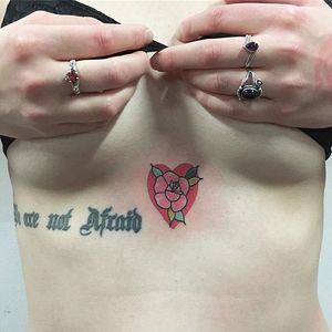 Rose in a heart tattoo by Lou DC. #LouDC #kawaii #girly #cute #pinkwork #rose #sternum #heart