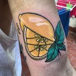 Neo traditional lemon and lemon segment tattoo by Jesus Cobo. #neotraditional #lemon #citrus #lemonslice #JesusCobo