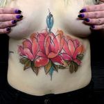 Abstract watercolor magnolia sternum tattoo by @ryzchu. #magnolia #flower #abstract #watercolor #ryzchu