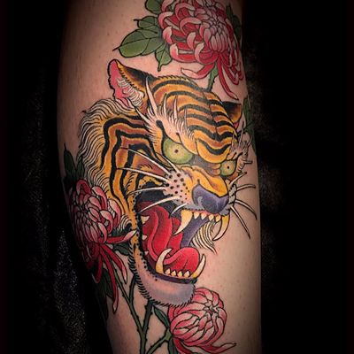 Tiger amongst Chrysanthemums by Matt Beckerich #MattBeckerich #color #Japanese #tiger #chrystanthemum #flowers #nature #tigerhead #floral #junglecat #cat #tattoooftheday