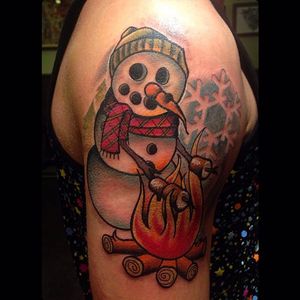 A ballsy snowman, toasting marshmallows on his arms. Tattoo by Amalie Ink. #neotraditional #fire #snowman #marshmallow #toastedmarshmallow #AmalieInk #snowflake #winter