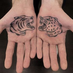 Palm jungle cat tattoos by Jenna Bouma aka Slower Black #JennaBouma #SlowerBlack #cattattoos #stickandpoke #handpoke #Nonelectric #junglecat #tiger #leopard #cheetah #junglecat #cat