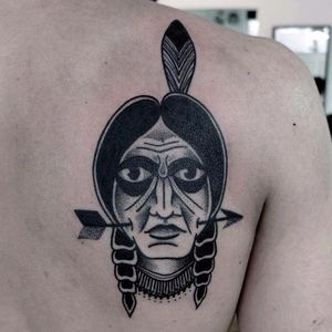 Striking native american tattoo of bold black and dotwork, photo from portfolio on iamvagabond.co.uk #PaulHill #VagabondStudio #traditional #blackworkers #nativeamerican #dotwork