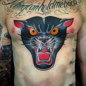 Powerful looking panther tattoo by Andrew Mcleod!  #AndrewMcleod #traditionaltattoo #panther #traditional #pantherhead