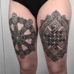An endless knot next to a dharmachakra by Nathan Mould (IG—nathanmouldtattoo). #blackwork #dharmachakra #endlessknot #NathanMould #ornamental #sacredgeometry