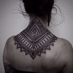 Beautiful mandala tattoo by Alexandra Bawn #nape #blacwork #sacredgeometry #mandala