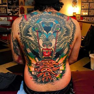 Strange and awesome beastly back piece tattoo by Jon Larson @LarsonTattoos111 #JonLarson #LarsonTattoos #Neotraditional #Bright #Bold #Wolf