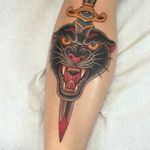 Dagger through a growling panther's head. Awesome tattoo by Graham Beech. #GrahamBeech #NeoTraditional #AnimalTattoos #panther #pantherhead #dagger