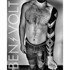 Fantastic black sleeve tattoo done by Ben Volt. #benvolt #black #sleeve #geometric #tattoo