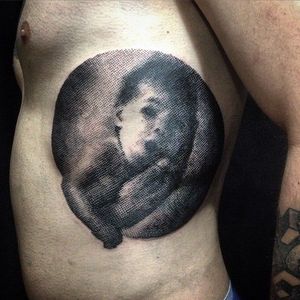 Super cool halftone portrait tattoo of a baby. Tattoo done by Anich Andrew. #anichandrew #blackwork #dotwork #halftone #portrait