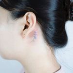 Floral behind-the-ear tattoo by Sol. #Sol #flower #floral #microtattoo #fineline #subtle #micro #tiny #feminine #girly #behindtheear #trend #southkorean